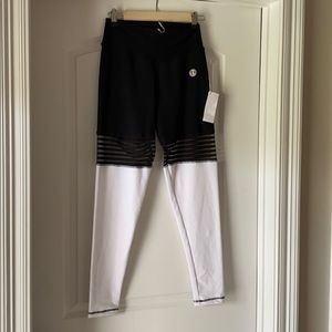 DTina’s white black with peep through leggings